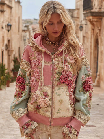 Sweat à capuche zippé confortable avec broderie florale vintage et patchwork. 