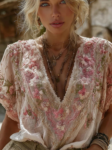 Camiseta vintage de mujer con cuello en V y bordado floral 